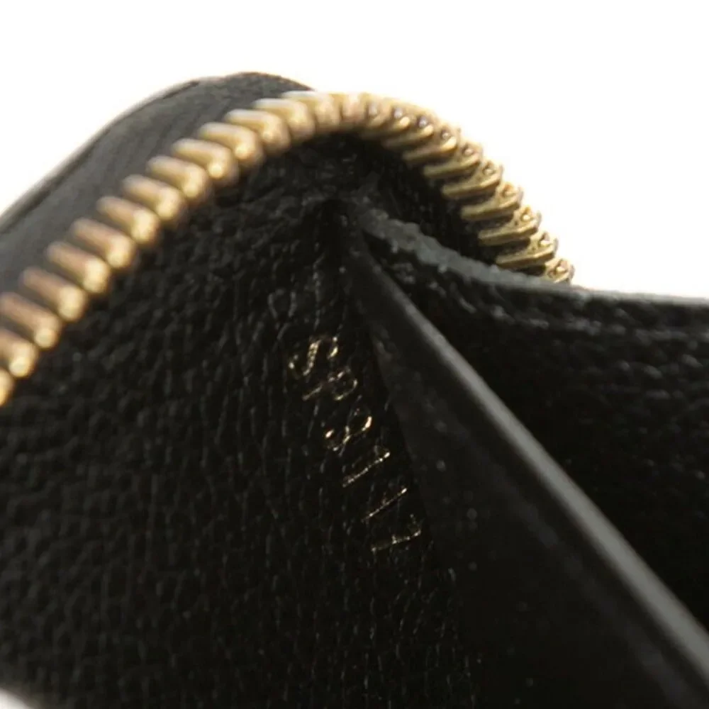 Louis Vuitton Monogram Empreinte Zippy Wallet M61864
